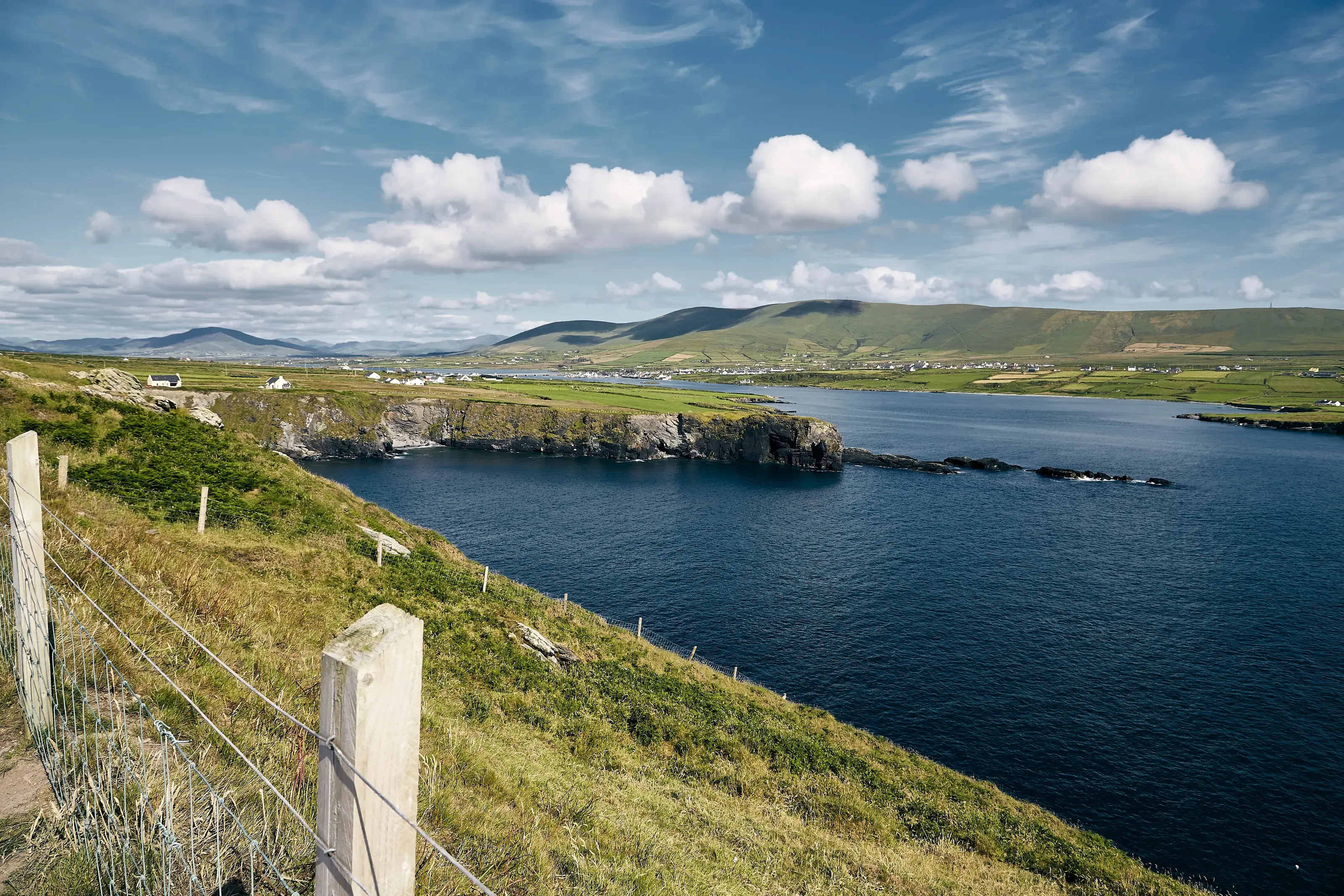 Green fields and Valentia Island under a bright Kerry sky