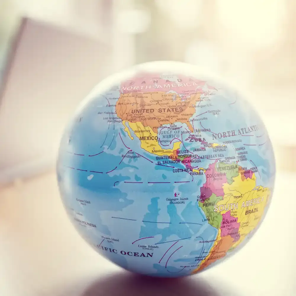 Close-up of a world globe showing the Americas